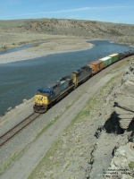 CSX 21 AC44CW entering McAdows Canyon along Yellowstone River